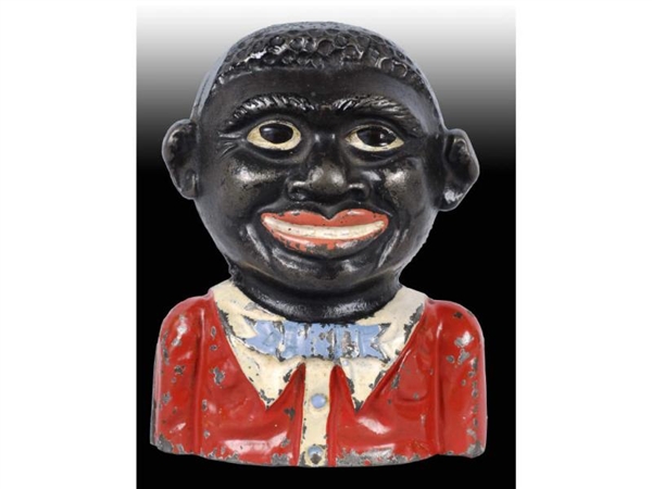 CAST IRON YOUNG BLACK AMERICAN STILL BANK.        