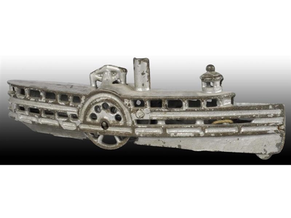 CAST IRON STEAM BOAT PULL TOY.                    