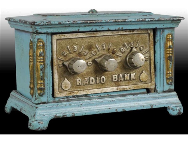 CAST IRON LARGE 3-DIAL RADIO STILL BANK.          