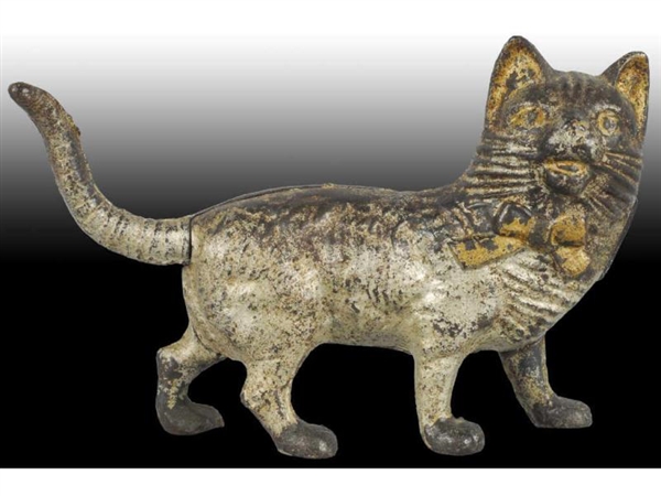 CAST IRON CAT WITH LONG TAIL STILL BANK.          