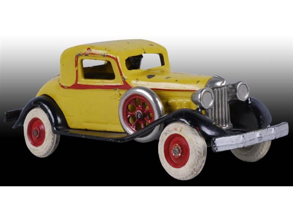 CAST IRON 1931 ARCADE REO COUPE TOY.              