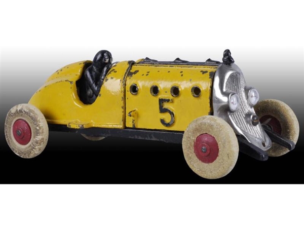 CAST IRON HUBLEY #5 YELLOW RACER CAR TOY.         