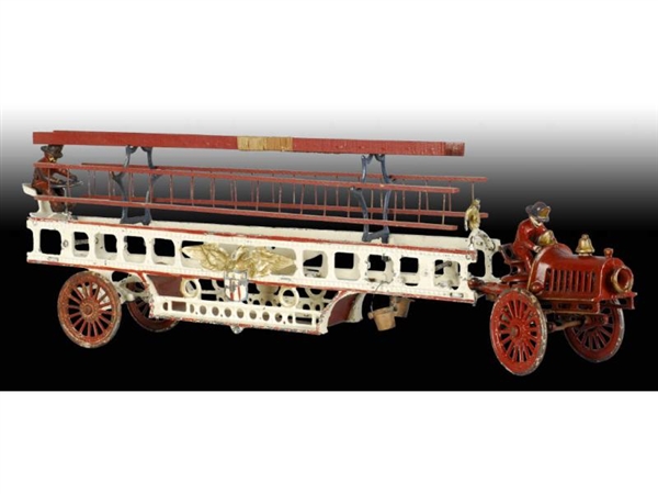 CAST IRON HUBLEY TRANSITIONAL LADDER TRUCK TOY.   