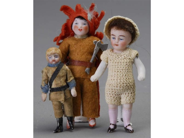 LOT: THREE SMALL ALL BISQUE DOLLS                 
