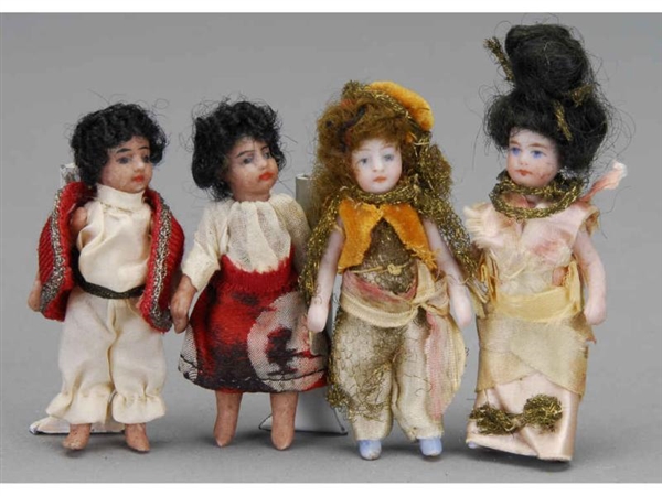 LOT: FOUR SMALL FRENCH ALL BISQUE DOLLS           