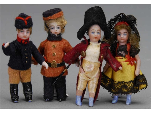 LOT: FOUR SMALL FRENCH ALL BISQUE DOLLS           