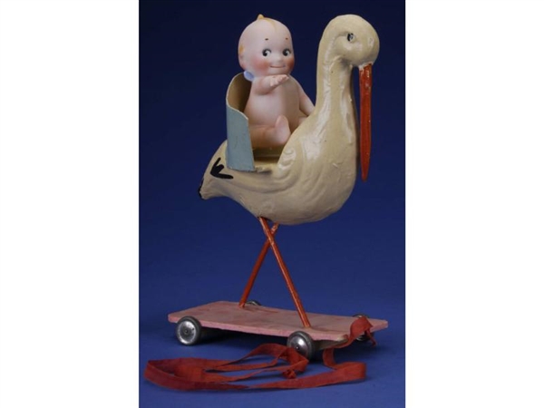 ROSE ONEILL ACTION KEWPIE WITH STORK PULL TOY    