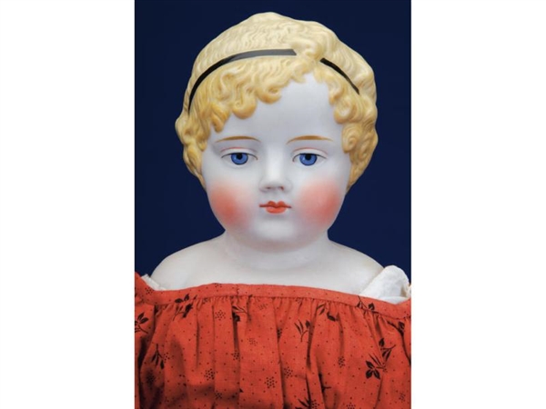 UNUSUAL PARIAN CHILD WITH MOLDED HEADBAND         