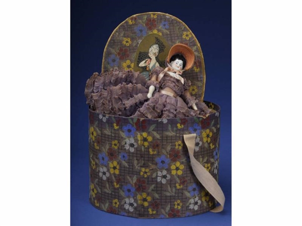 HAT BOX WITH CHINA DOLL                           