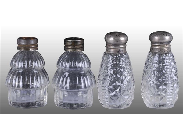 LOT OF 4: SMALL GLASS SHAKERS.                    