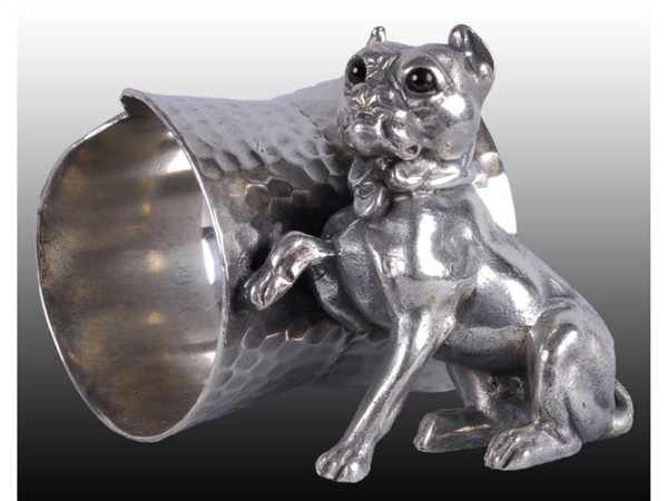 DOG WITH GLASS EYES FIGURAL NAPKIN RING.          