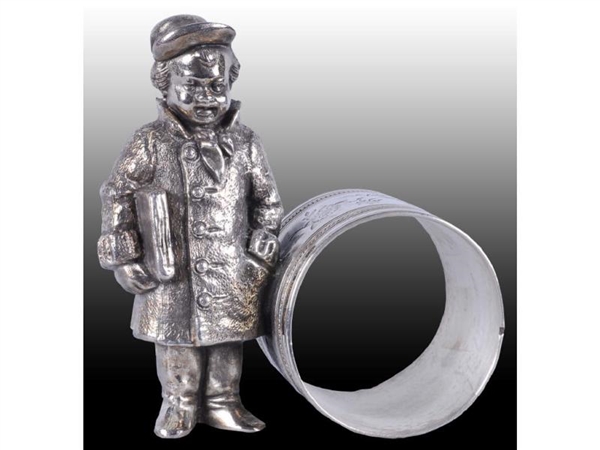 YOUNG BOY WITH NEWSPAPER FIGURAL NAPKIN RING.     