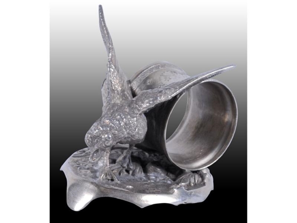 BIRD WITH UPRAISED WINGS FIGURAL NAPKIN RING.     