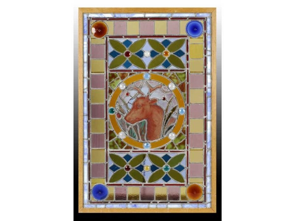 ANTIQUE STAINED GLASS WINDOW WITH DEER.           