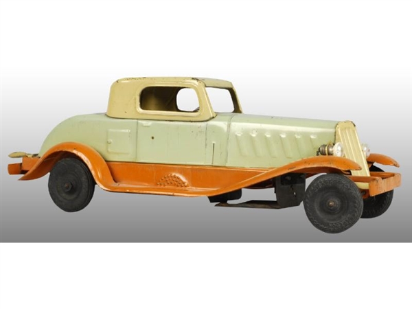 PRESSED STEEL GIRARD TOY AUTOMOBILE.              