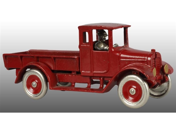 CAST IRON  ARCADE RED BABY STATIONARY BED TRUCK.  