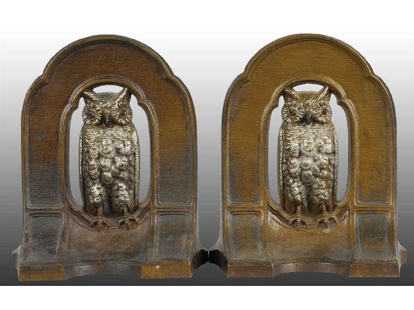 OWL PERCHED IN ARCHWAY B&H CAST IRON BOOKENDS.    