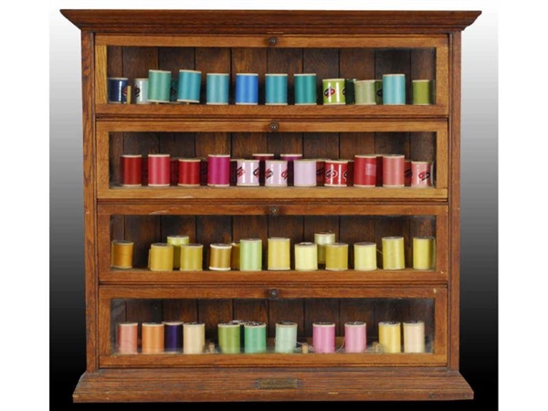 RIBBON CABINET WITH SPOOLS.                       