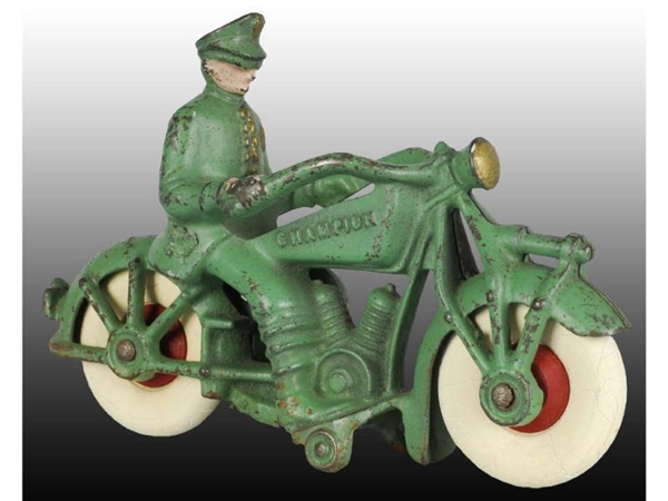 CAST IRON GREEN CHAMPION POLICE MOTORCYCLE TOY.   