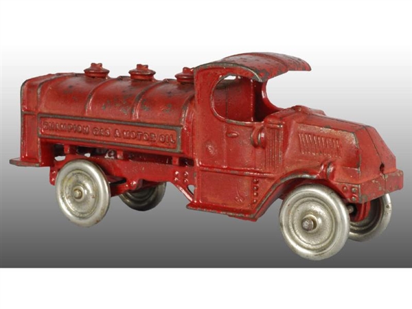CAST IRON RED CHAMPION MACK GAS & OIL TRUCK TOY.  