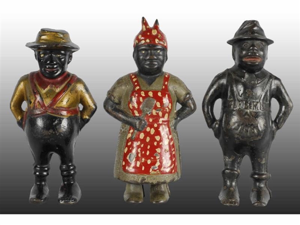 LOT OF 3: CAST IRON FIGURAL AFRICAN STILL BANKS.  