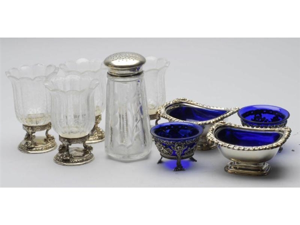 LOT OF 9: ASSORTED GLASS AND SILVER PIECES.       