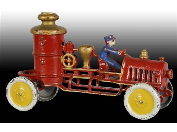 EARLY CAST IRON FIRE PUMPER TOY.                  
