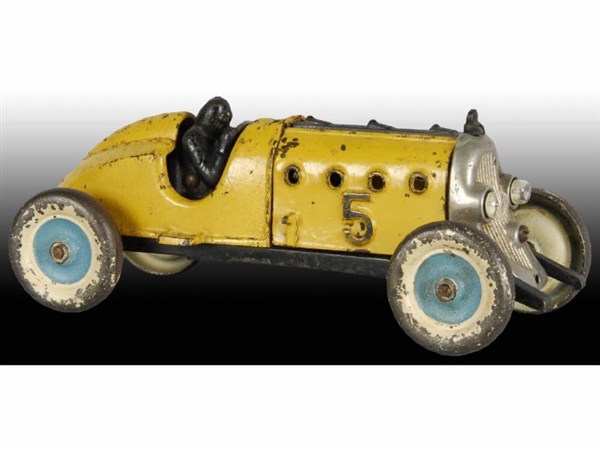 CAST IRON HUBLEY NUMBER 5 YELLOW RACER CAR TOY.   