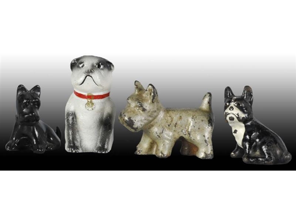 LOT OF 4: DOG PAPERWEIGHTS.                       