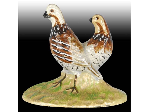 QUAIL HUBLEY CAST IRON PAPERWEIGHT.               