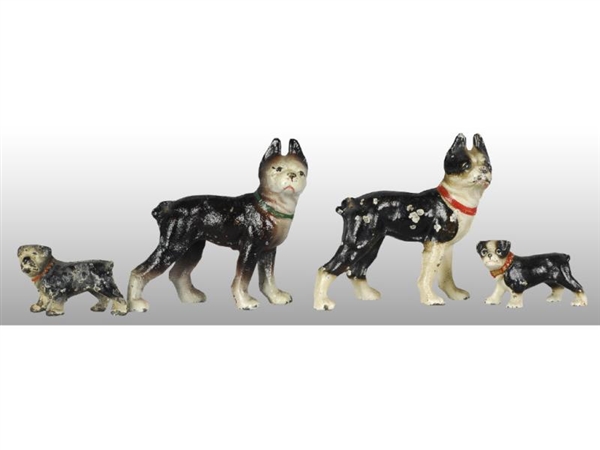 LOT OF 4: CAST IRON BOSTON TERRIER DOGS.          