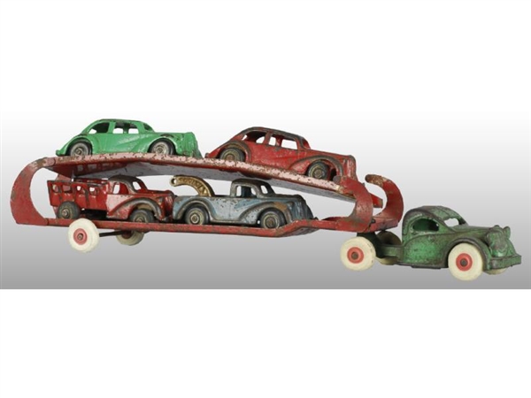 CAST IRON ARCADE CAR CARRIER WITH 4 VEHICLE LOAD. 