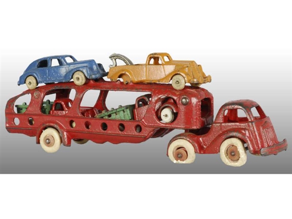 CAST IRON HUBLEY CAR CARRIER  TOY WITH 4 CARS.    