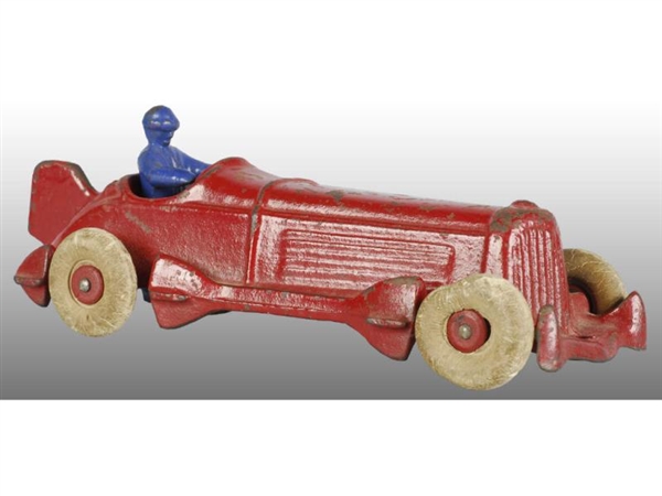 CAST IRON CHAMPION TOY RACER WITH BLUE DRIVER.    