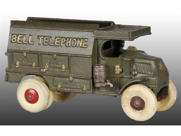 CAST IRON GREEN BELL TELEPHONE TRUCK TOY.         