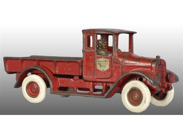 CAST IRON ARCADE RED BABY FIXED BED TRUCK TOY.    
