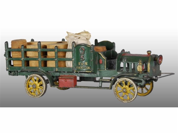 CAST IRON HUBLEY 5-TON STAKE TRUCK TOY.           