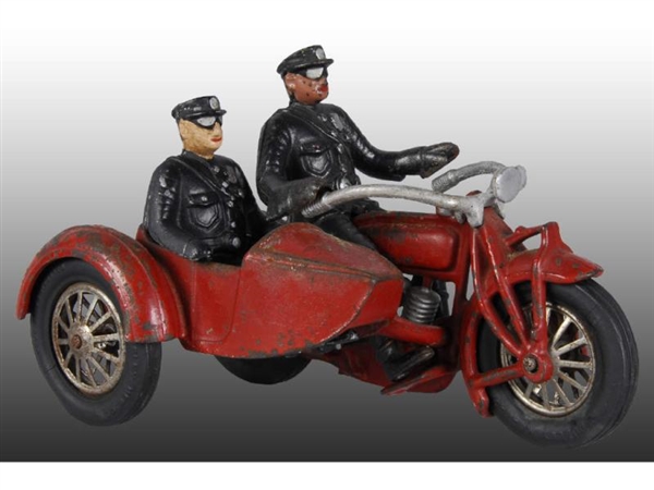 CAST IRON TWO CYLINDER MOTORCYCLE AND SIDECAR TOY.