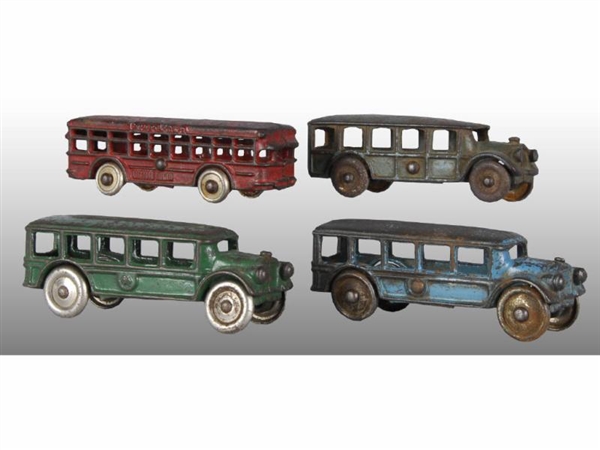 LOT OF 4: CAST IRON SMALL BUS TOYS.               