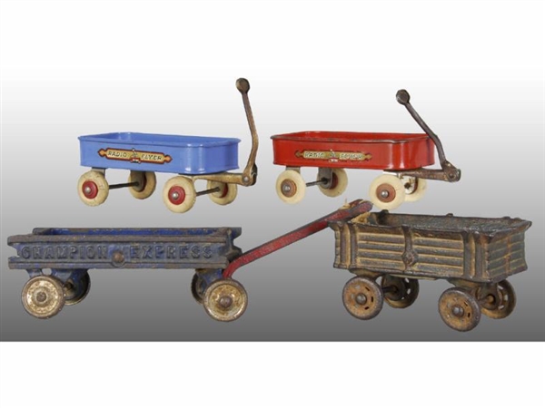 LOT OF 4: CAST IRON AND TIN FOUR WAGON TOYS.      
