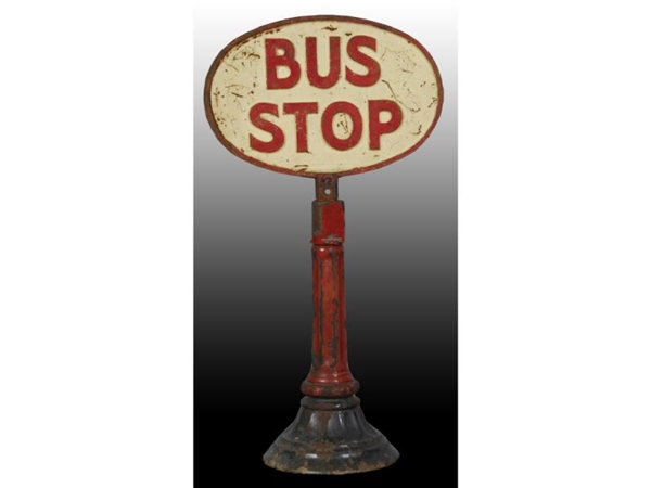 UNUSUAL CAST IRON BUS STOP SIGN.                  