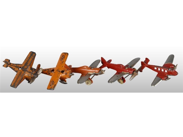 LOT OF 5: CAST IRON SMALL AIRPLANE TOYS.          