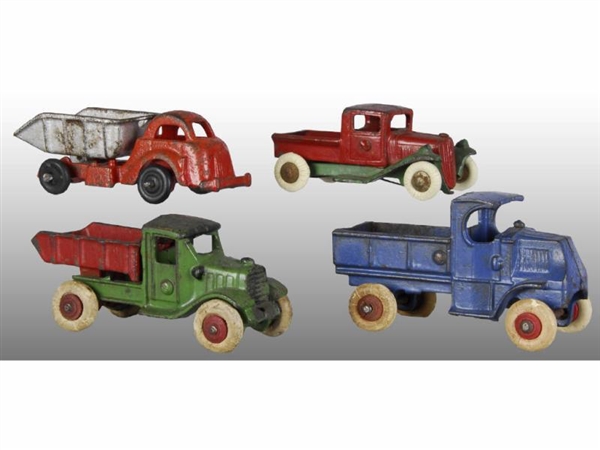 LOT OF 4: CAST IRON  WORK TRUCK TOYS.             