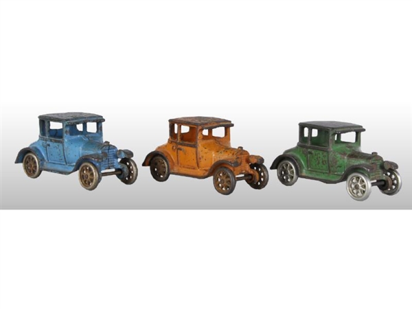 LOT OF 3: CAST IRON MODEL T COUPE TOYS.           