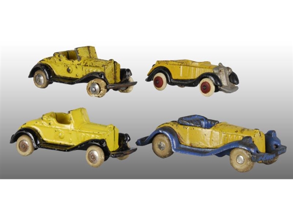 LOT OF 4: YELLOW OPEN ROADSTERS.                  