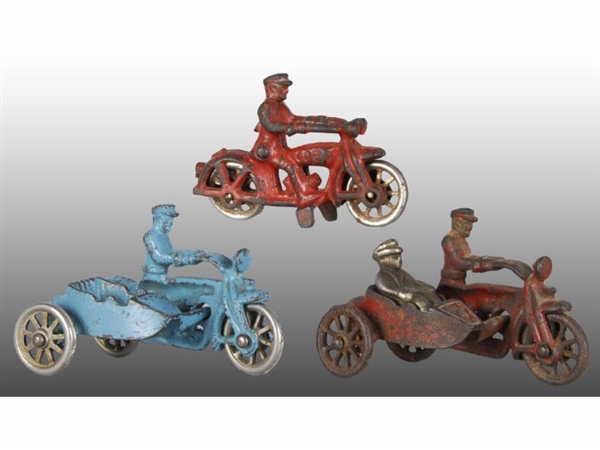 LOT OF 3: CAST IRON MOTORCYCLE TOYS, 2 WITH SIDECA