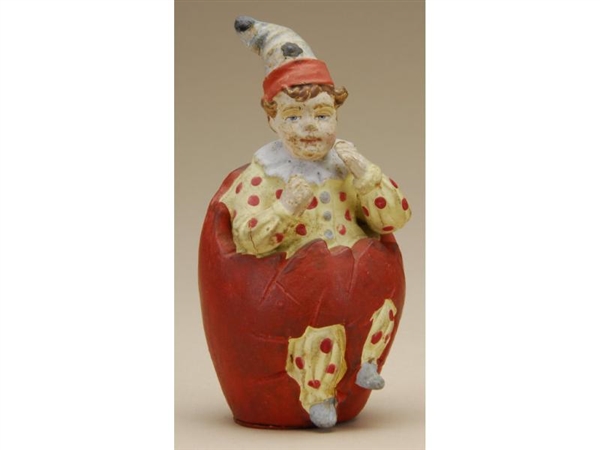 CLOWN IN EGG CANDY CONTAINER                      