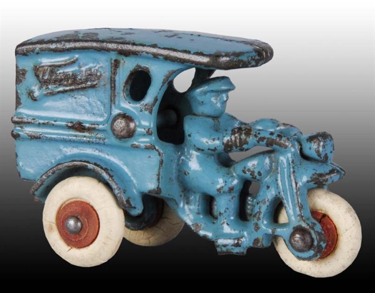 CAST IRON HUBLEY FLOWERS MOTORCYCLE TOY.          