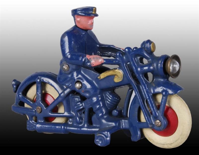 CAST IRON HUBLEY TOY MOTORCYCLE.                  