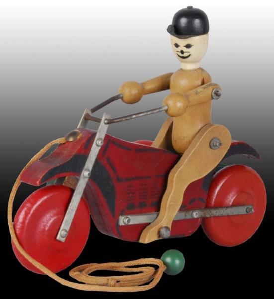 UNUSUAL RICH TOYS MOTORCYCLE SIDECAR PULL TOY.    